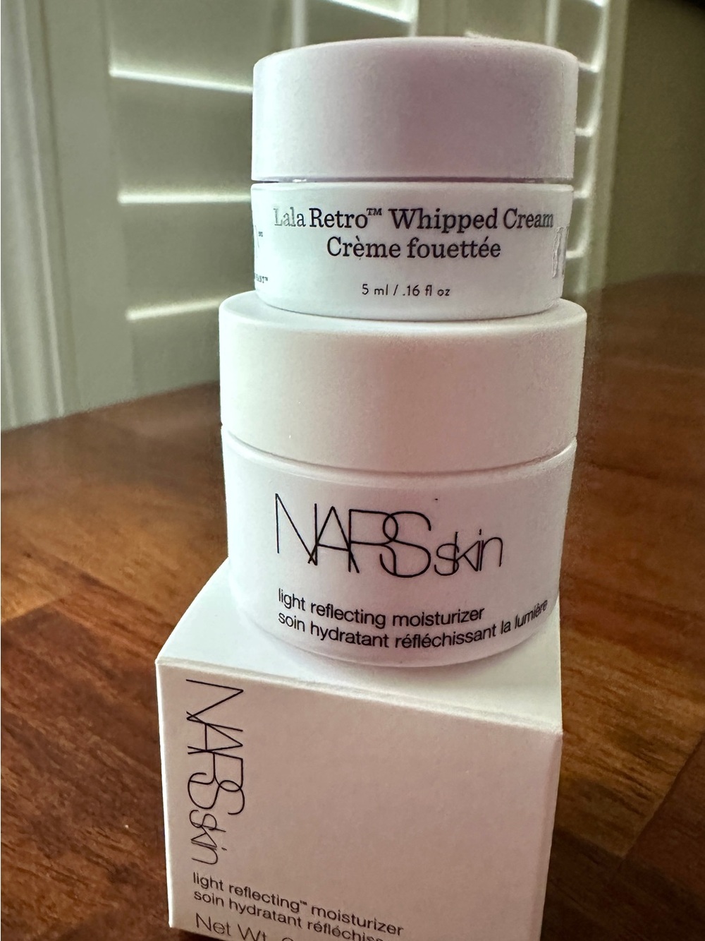 NARS Skin Light Reflecting Moisturizer &
Drunk Elephant Lala Retro Whipped Cr